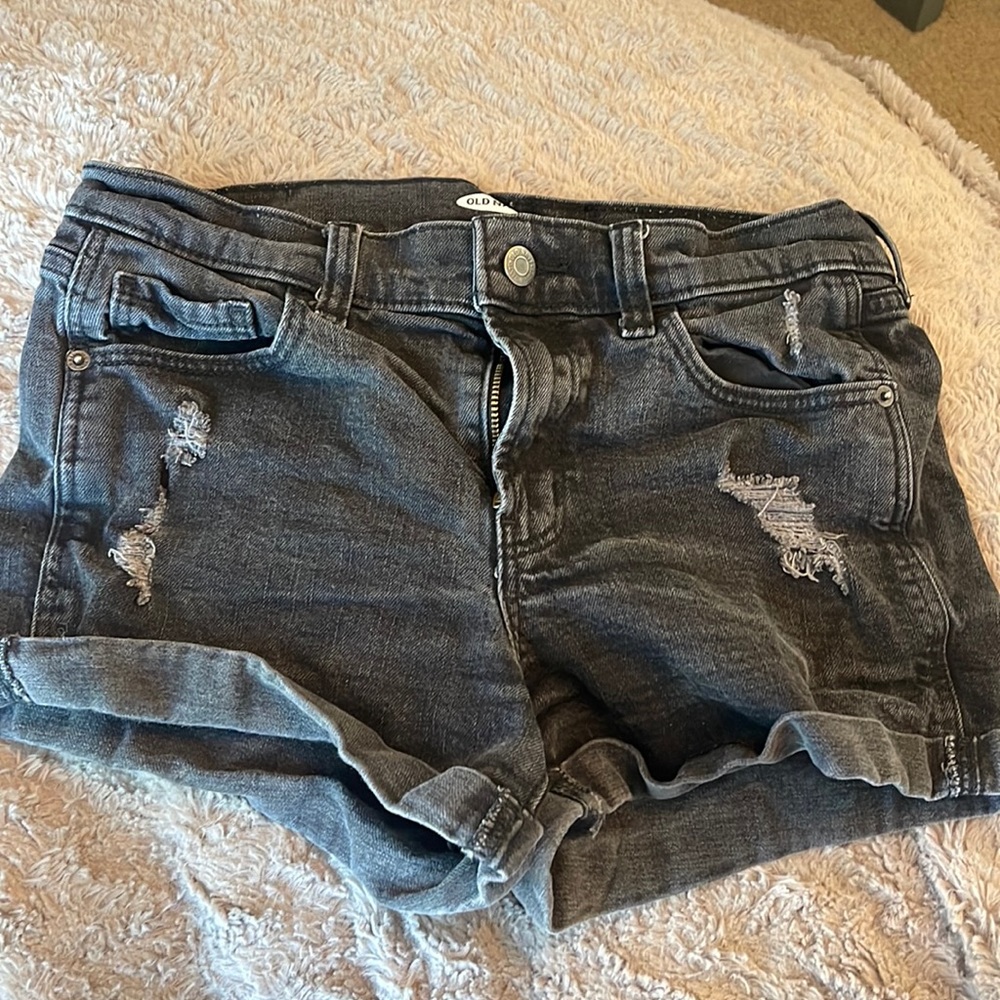 great condition, kids size 2, black, two gray rips